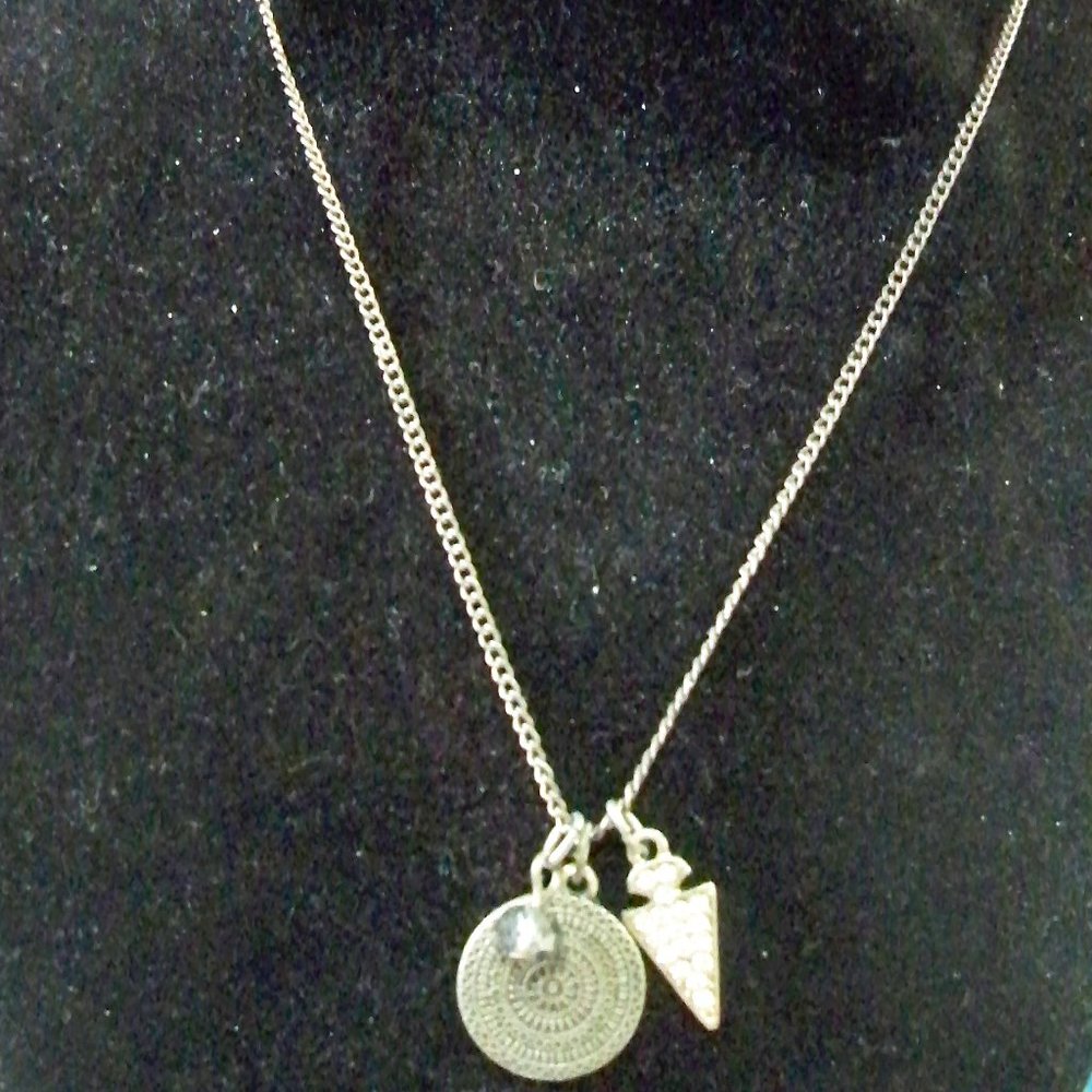 THREE SILVER CHARMS ON A SILVER TONE CHAIN